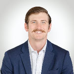 Headshot of Taylor Wilson, real estate agent