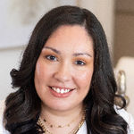 Headshot of Raquel Hood, real estate agent