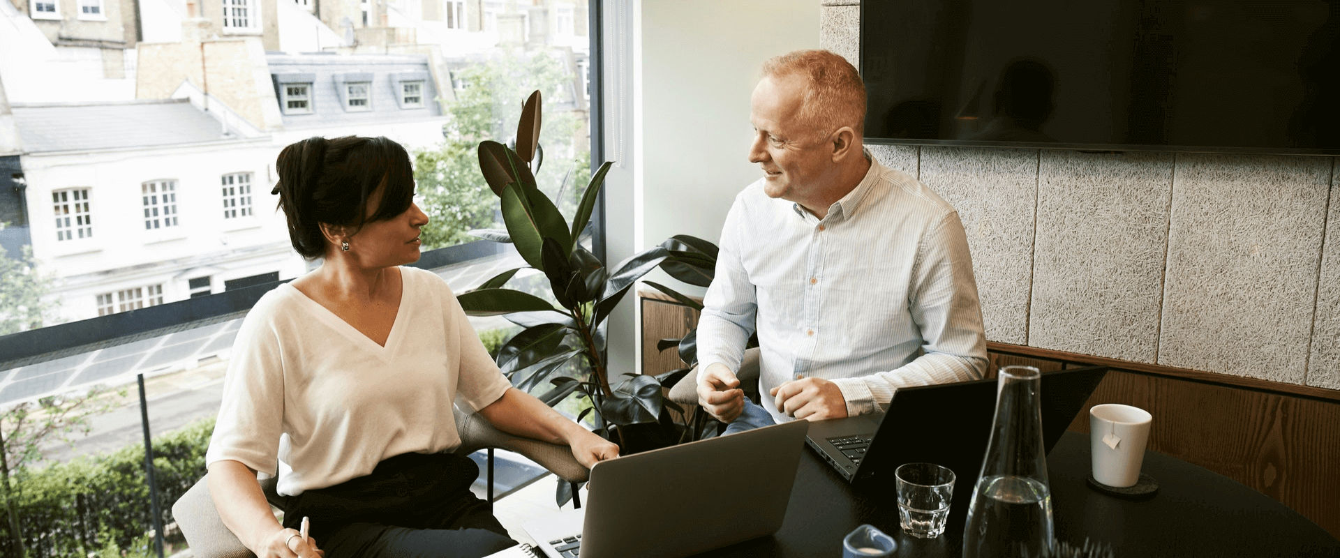 A Real Estate Agent with a Client - FastExpert