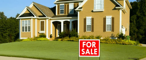house with for sale sign for advertising