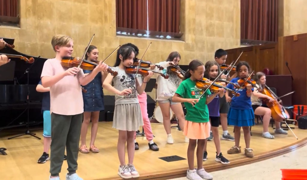 hungry for music after school kids playing violins
